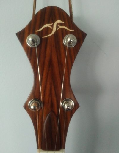 Bookmatched Rosewood Headstock with Curly Maple Loon Inaly