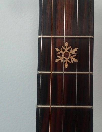 Curly Maple Inlays of Bicycle Wheel Snowflake Mountains on Ebony Fingerboard