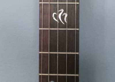 Great Northern Loon Rosewood Fret board with Mother of Pearl Inlays