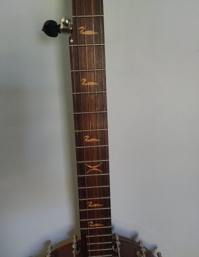 Rosewood Fingerboard with Birdseye Maple Loons